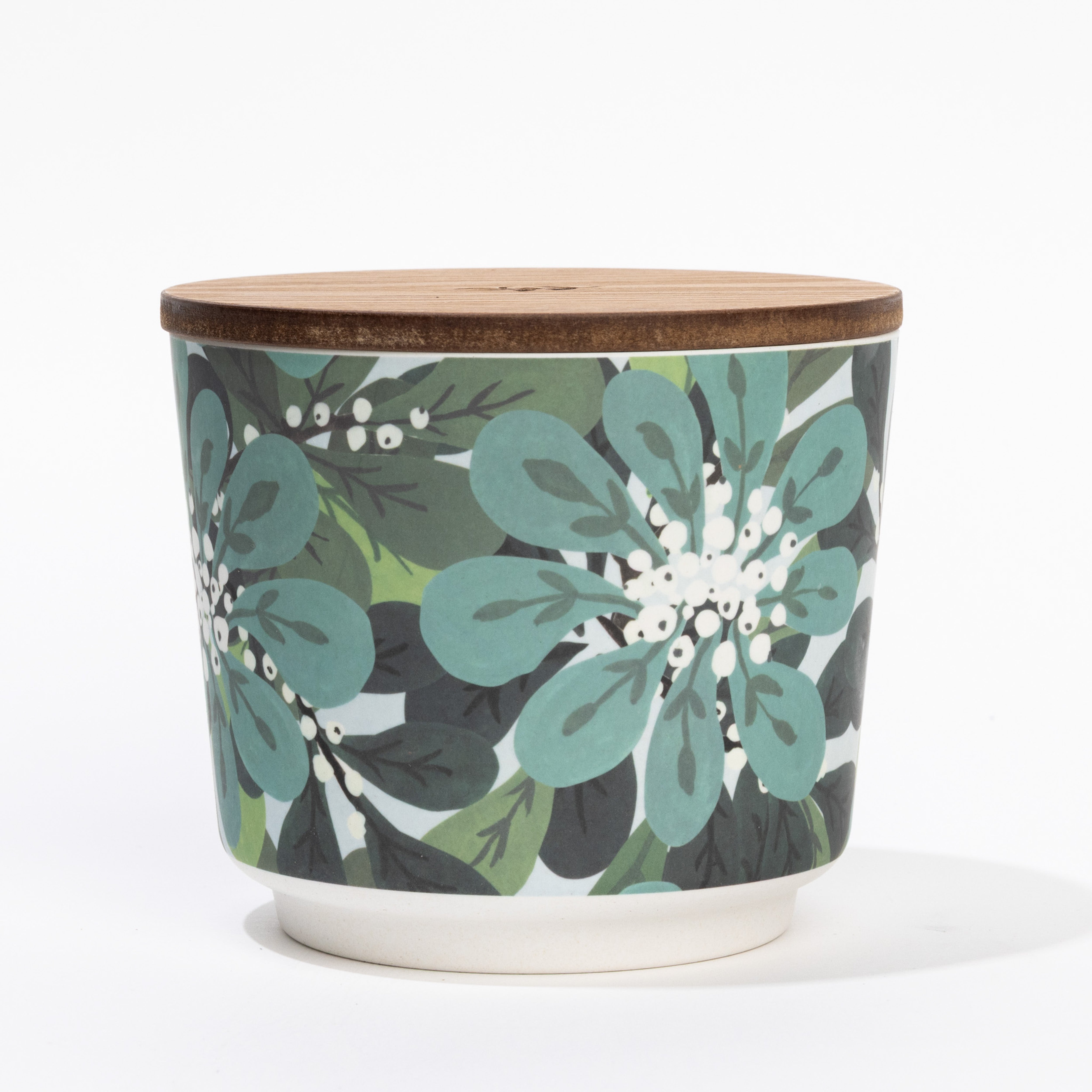 Add elegance to any room with the Greenleaf Gifts Shimmering Snowberry Patterned 3 Wick Candle, featuring a floral design in green, teal, and white on a dark background with a wooden lid.