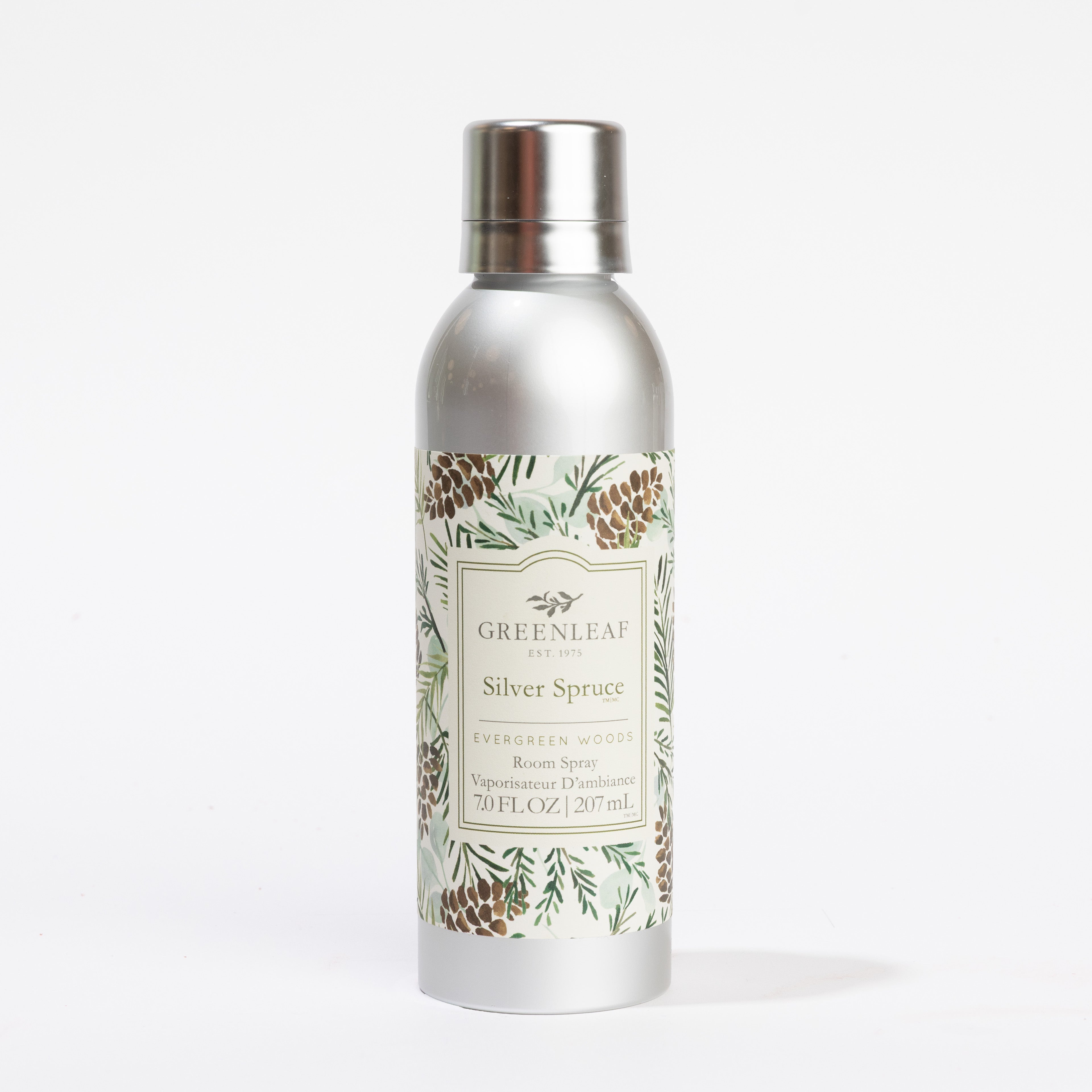 The Greenleaf Gifts Silver Spruce Room Spray is a non-aerosol 7 fl oz (207 mL) spray in a silver bottle with an evergreen pinecone design, providing refreshing Greenleaf fragrance against a plain white background.