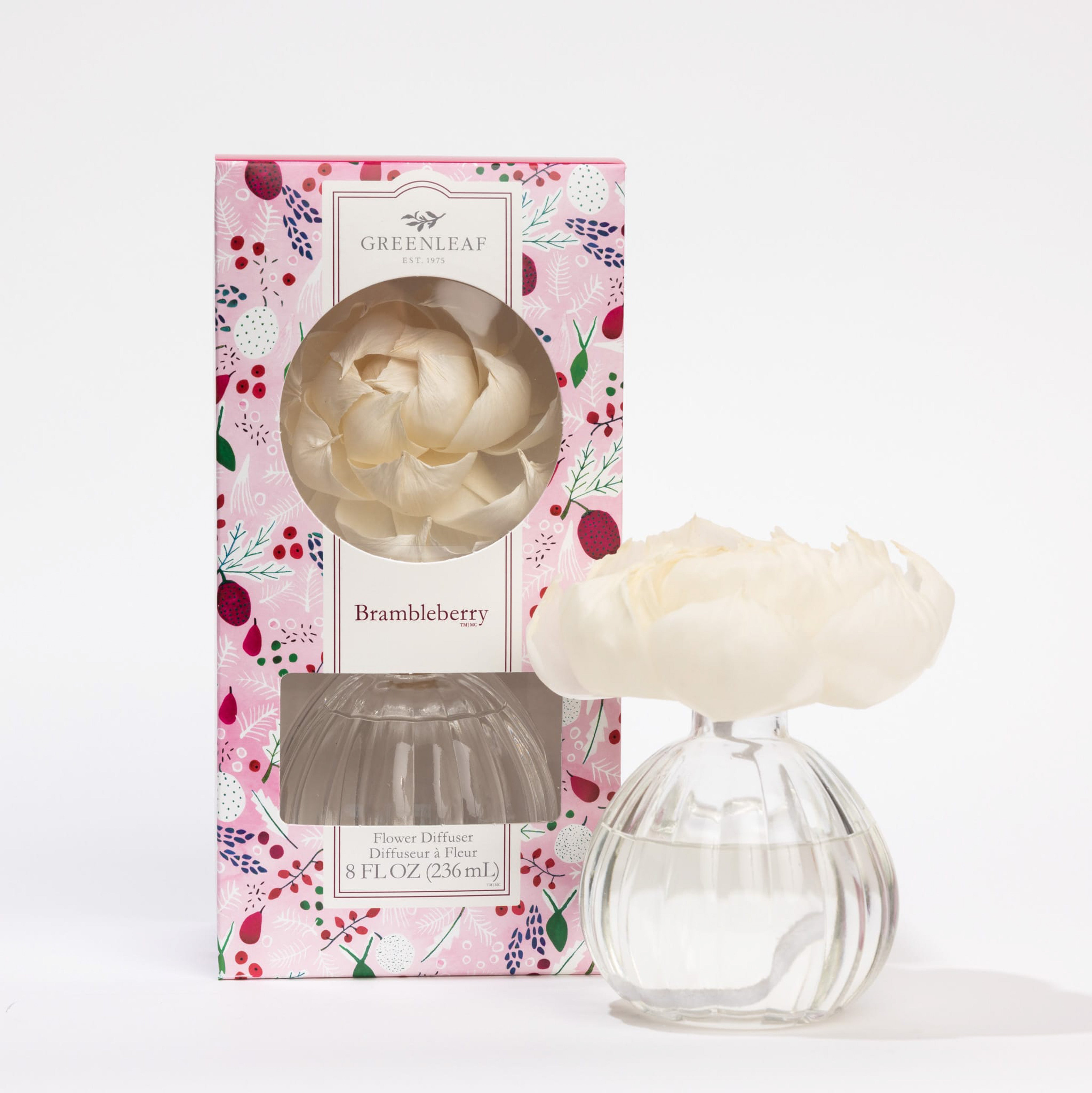 The Greenleaf Gifts Brambleberry Flower Diffuser, GLG966572S, comes in a pink floral-patterned box with a white flower topper and an 8 oz round glass bottle. Enjoy its fresh scent for up to 60 days.