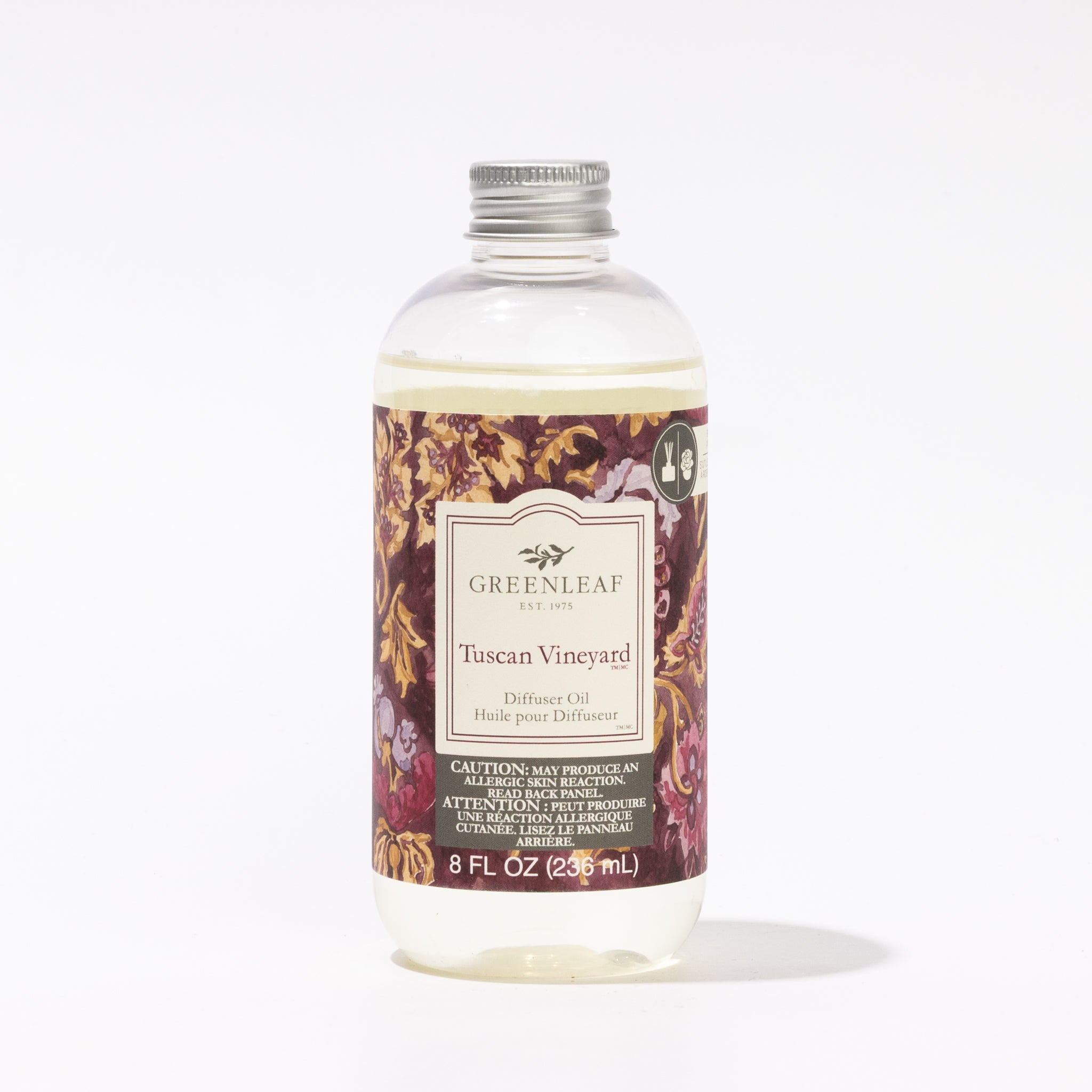 An 8 fl oz clear plastic bottle of Greenleaf Gifts Tuscan Vineyard Diffuser Oil, with a silver cap and floral label—ideal as a reed diffuser refill to refresh your home's fragrance.