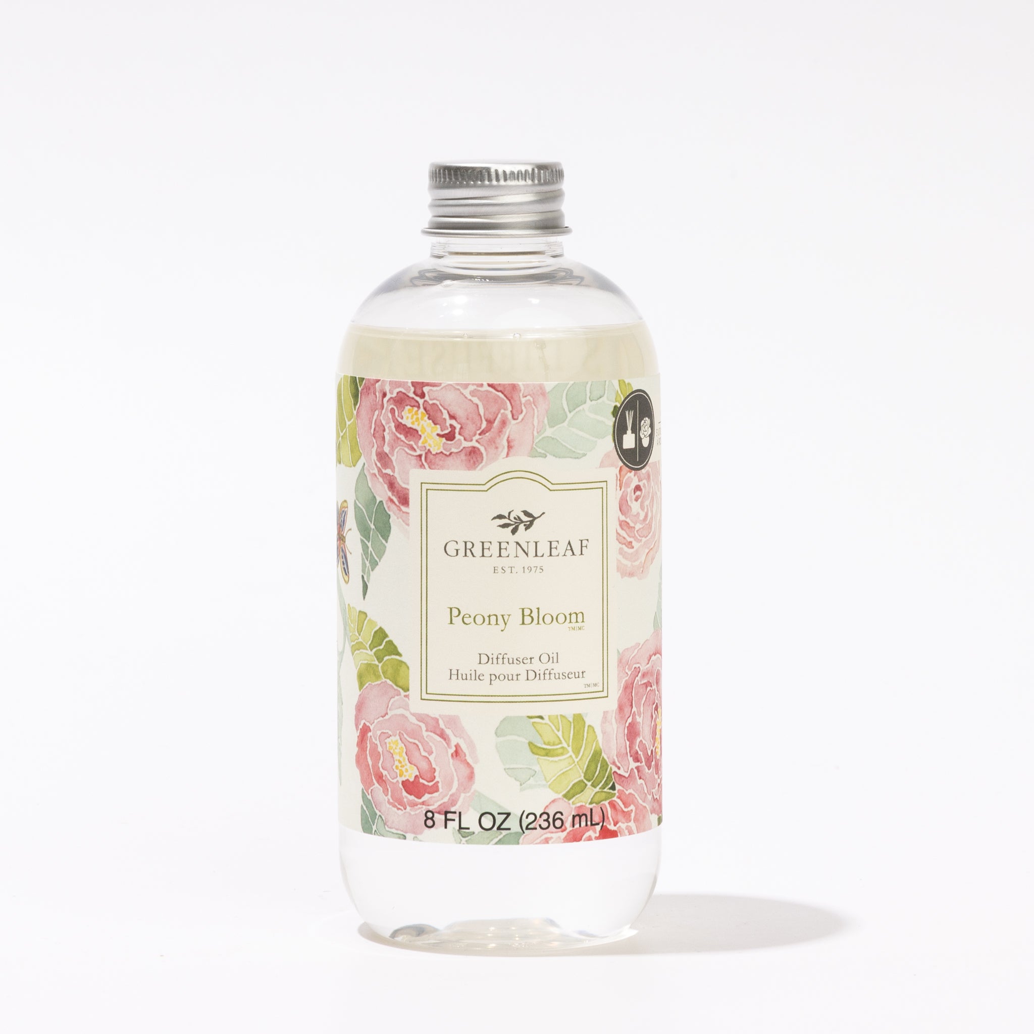 A clear 8 fl oz (236 ml) bottle of Greenleaf Gifts Peony Bloom Diffuser Oil with a silver cap, featuring a floral label decorated with pink peonies and green leaves. Perfect as a flower diffuser refill.