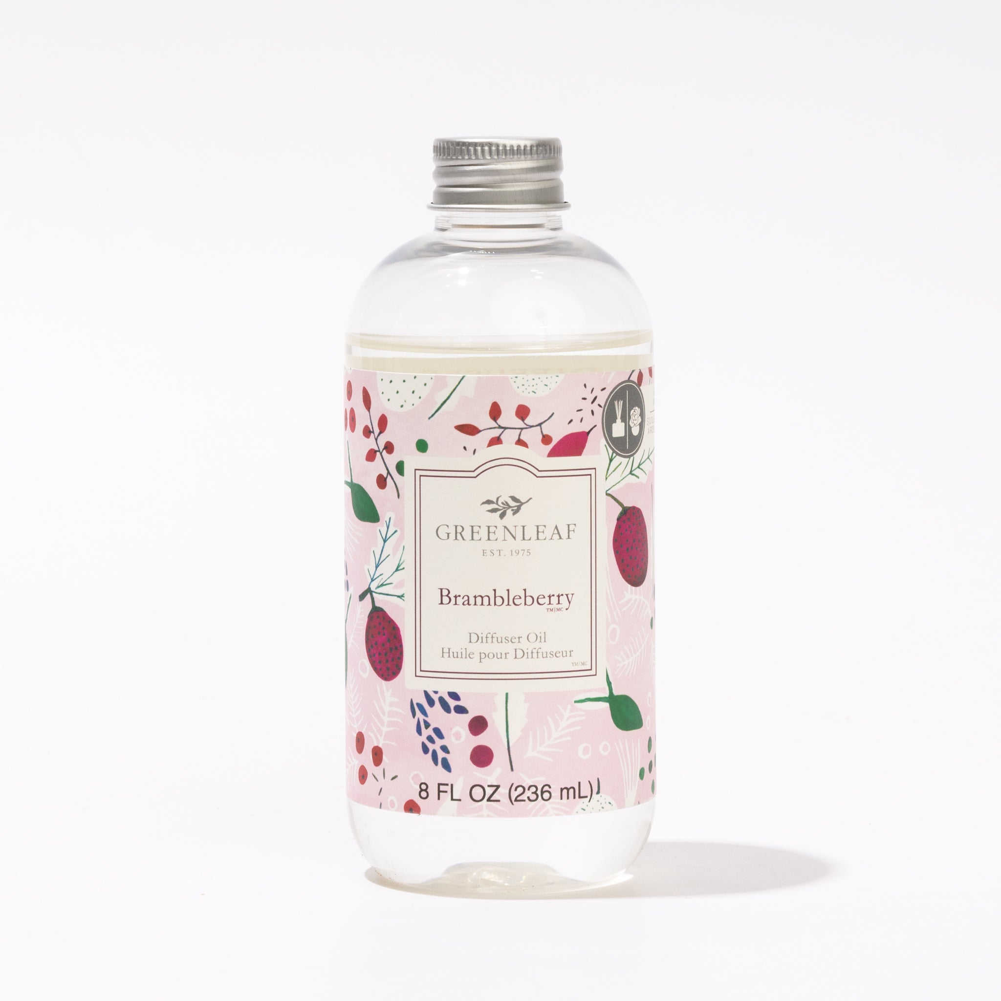 A clear plastic bottle of Greenleaf Gifts Brambleberry Diffuser Oil with a silver cap. The label shows berry and floral accents on light pink. Ideal as a Reed Diffuser refill, the bottle holds 8 fl oz (236 mL) of oil.