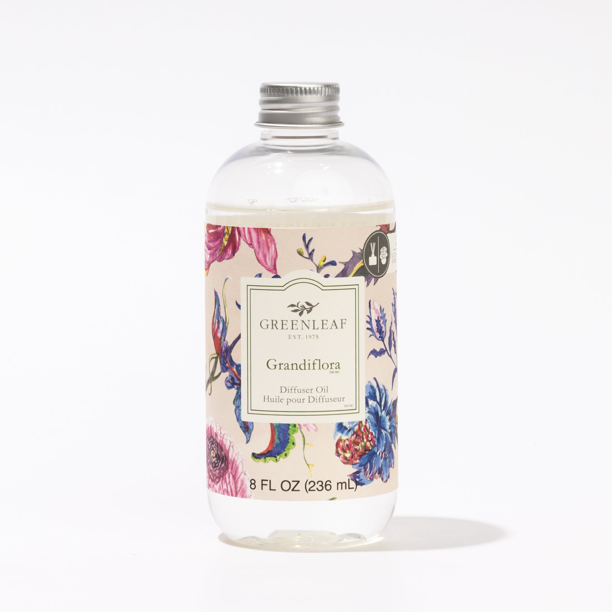 A clear bottle of Grandiflora Diffuser Oil by Greenleaf Gifts features a floral label and silver cap, contains 8 fl oz (236 mL), and is the perfect Reed Diffuser Refill against a crisp white background.