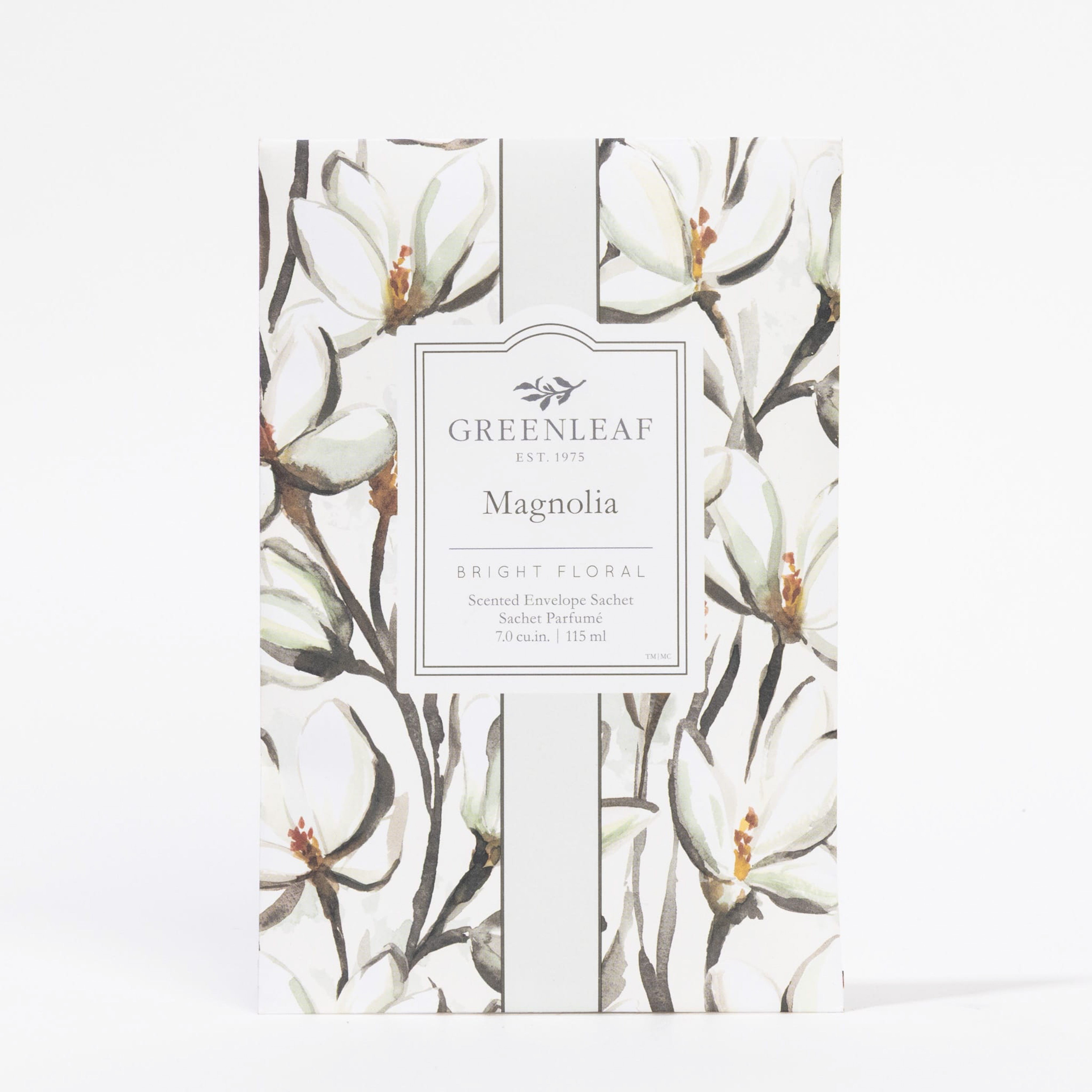 The Greenleaf Gifts Magnolia Sachet features a white label with illustrations of white magnolia flowers and brown branches, making it a perfect air freshener for your closet.