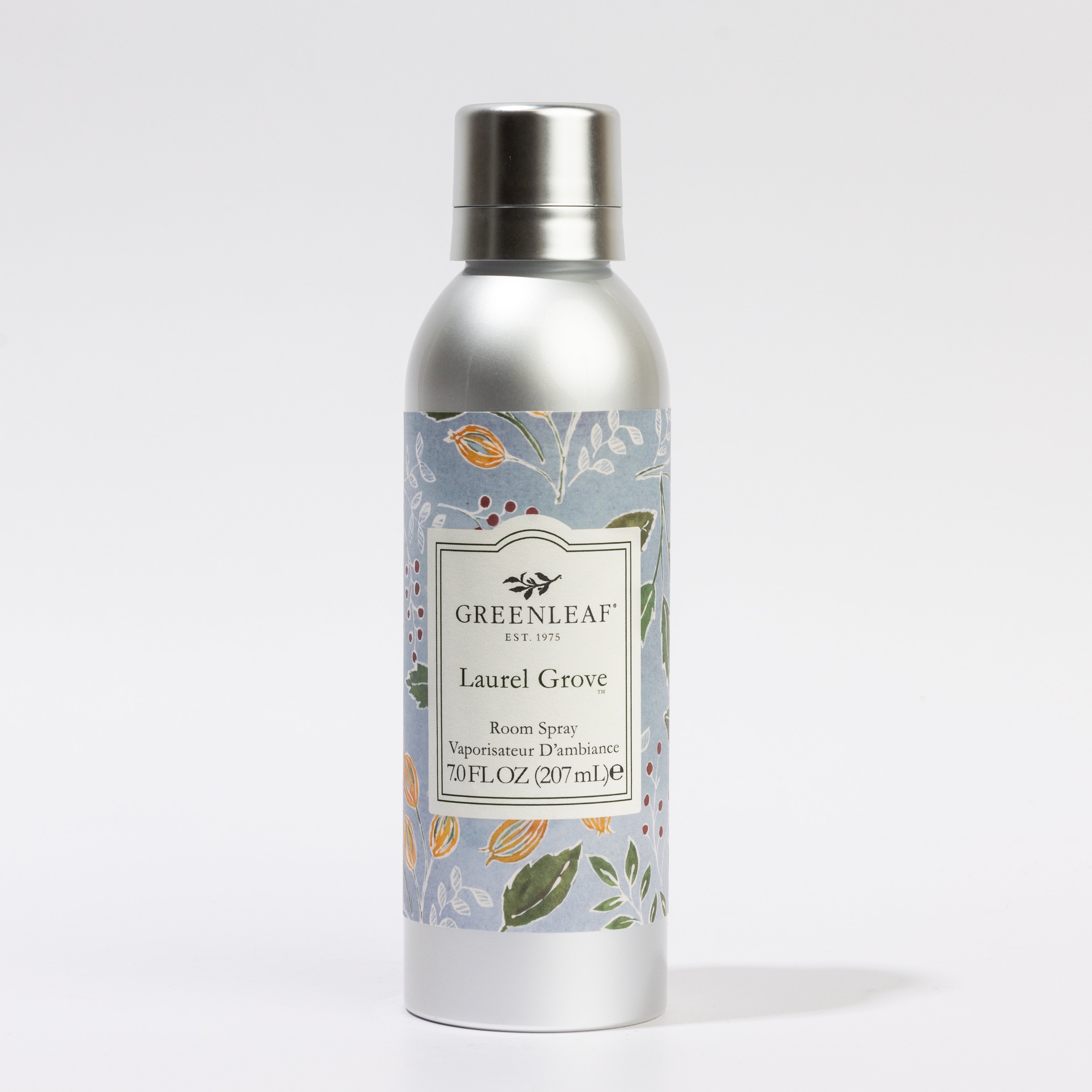 A 7 oz (207 ml) silver spray can of Greenleaf Gifts Laurel Grove Room Spray, adorned with a floral label design, is displayed against a plain white background.