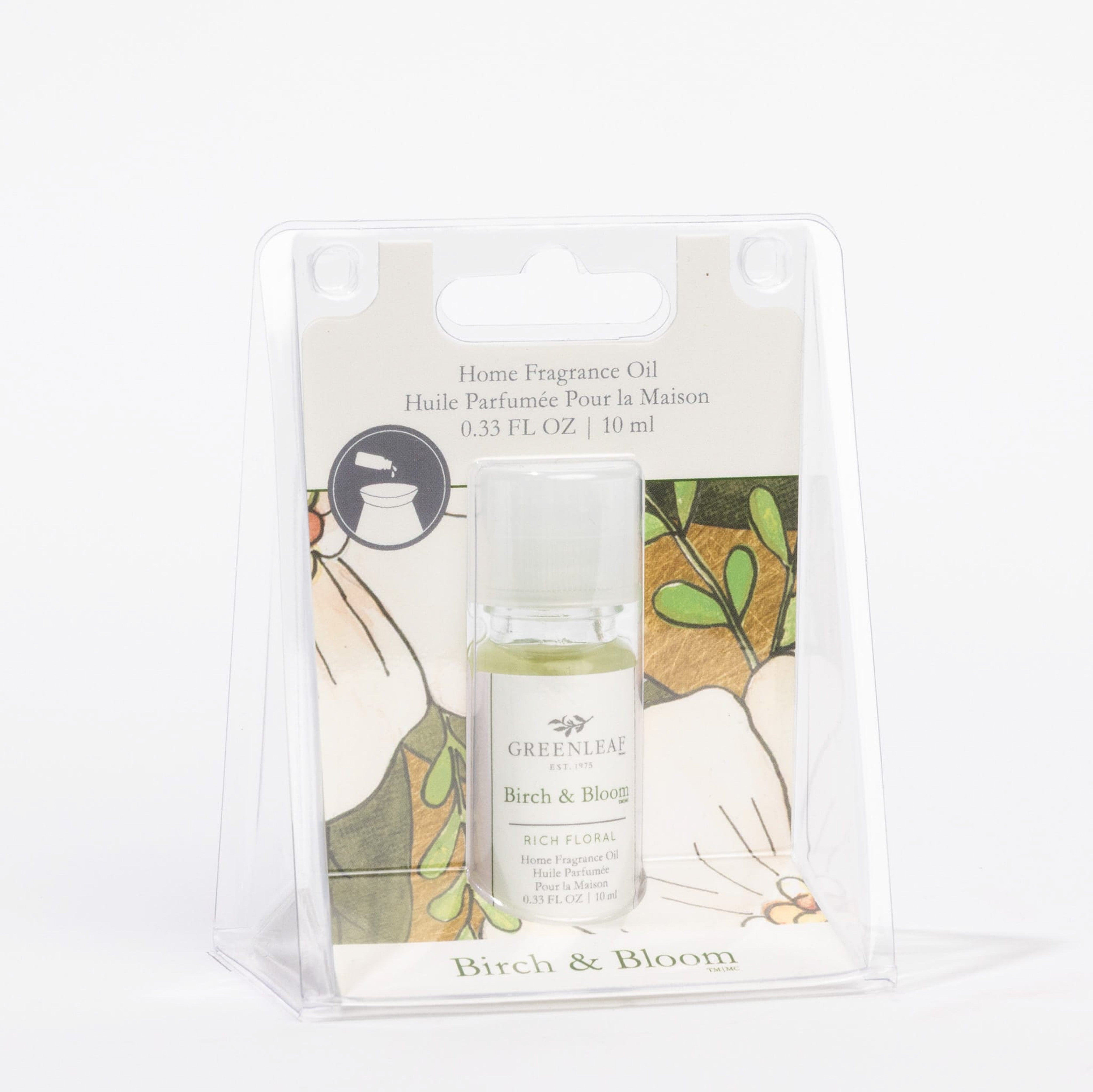 A 10 ml (0.33 fl oz) bottle of Greenleaf Gifts Birch & Bloom Home Fragrance Oil features rich floral notes in a clear package with floral artwork; it’s a flameless home fragrance.