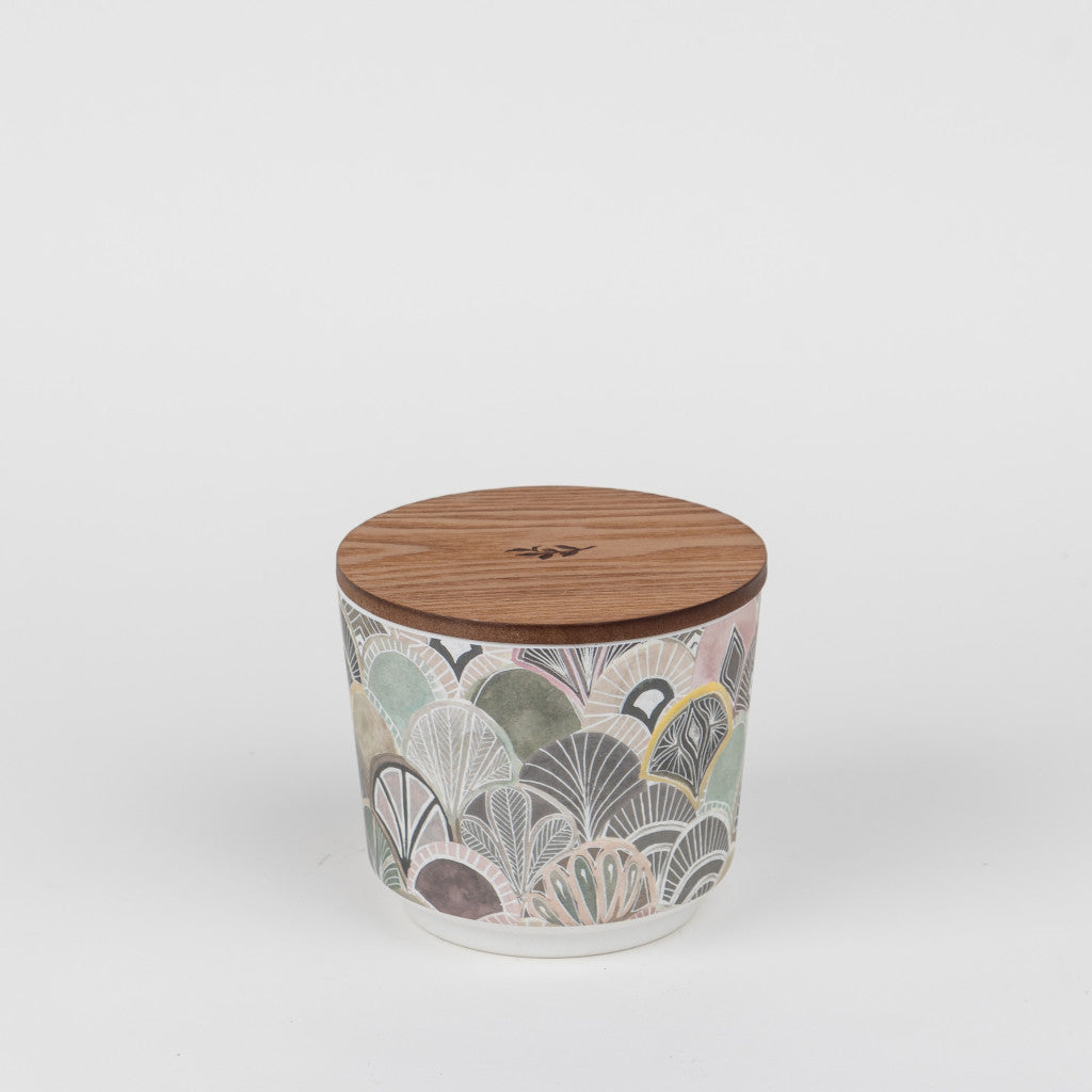 The Greenleaf Gifts Patterned 3 Wick Candle - Haven features a ceramic jar in muted green, grey, and beige with a wooden lid. The candle is displayed against a plain white background.