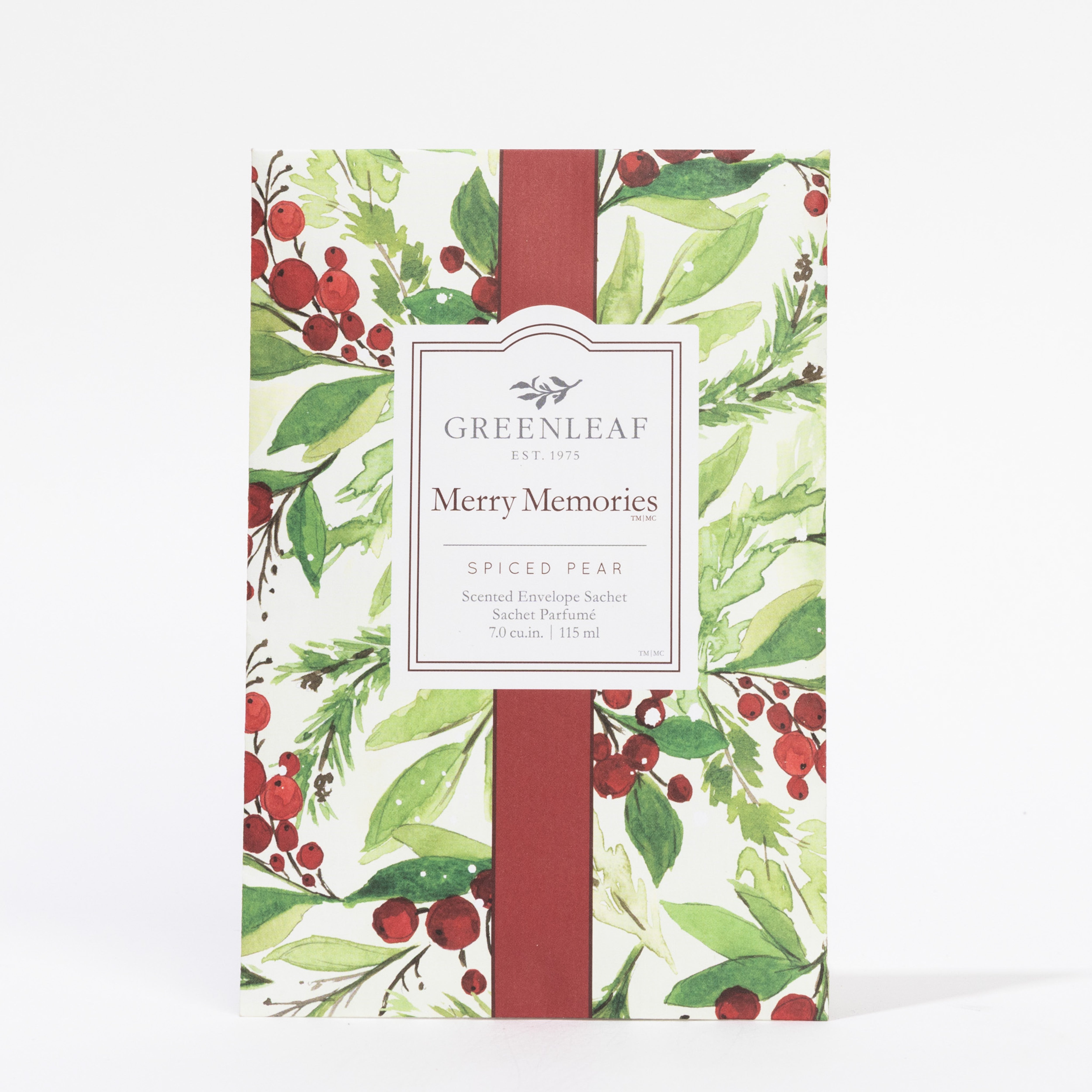 The Greenleaf Gifts Merry Memories Sachet in Spiced Pear features a festive red-berry and green-leaf design on white with a vertical red ribbon accent, offering long-lasting fragrance.