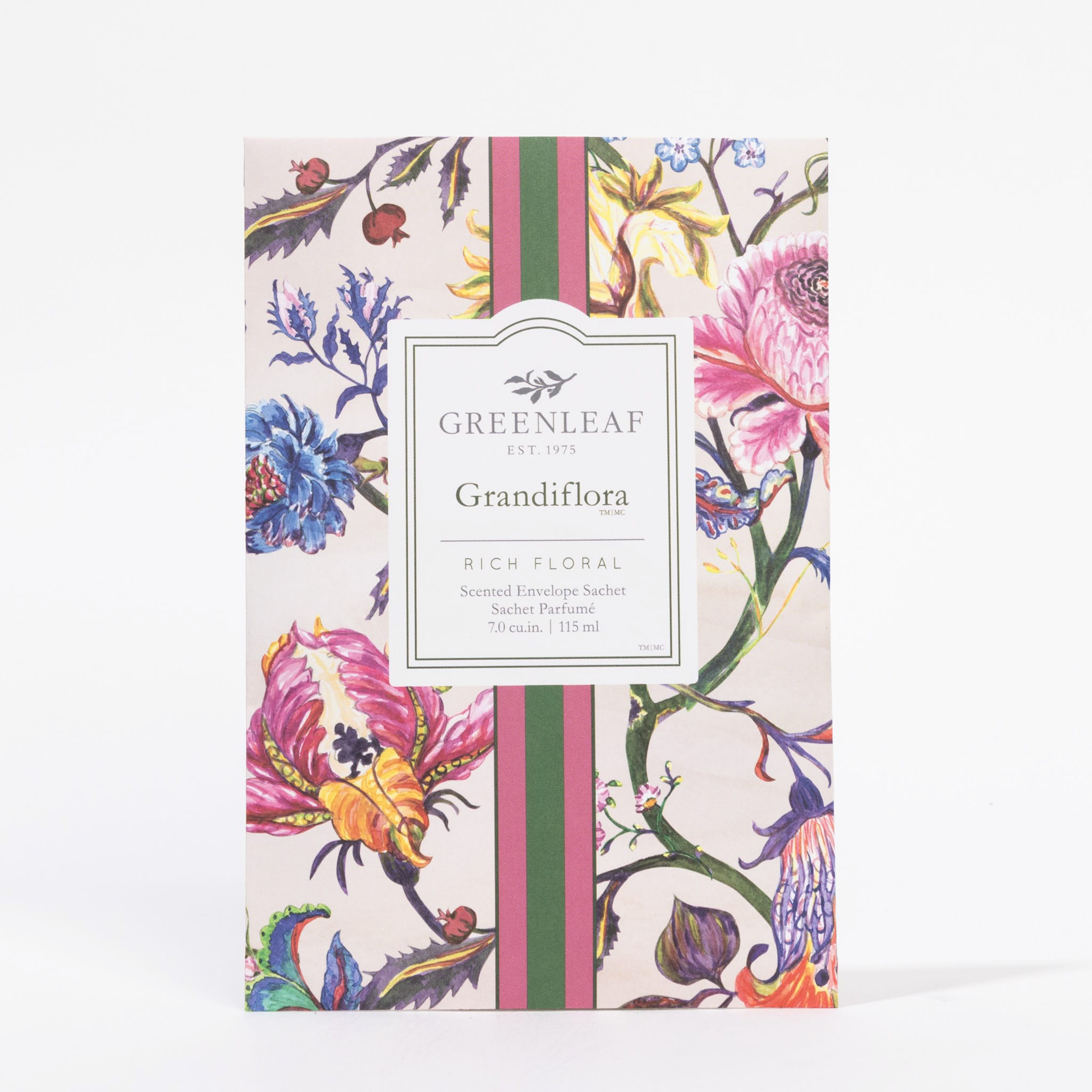The Greenleaf Gifts Grandiflora Sachet features a floral design with pink and green stripes, colorful flowers, and a white center label, offering long-lasting home fragrance.
