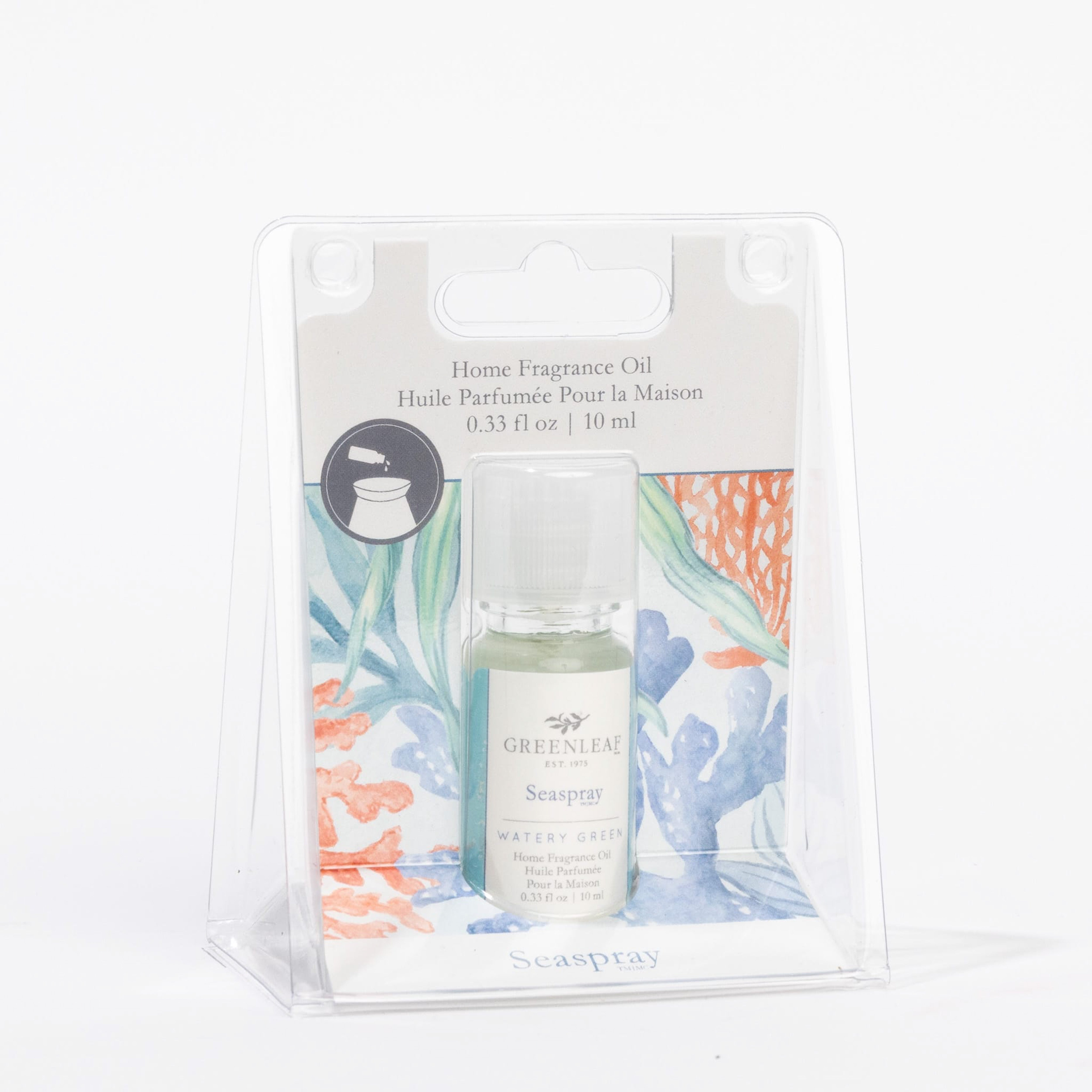 A 10 ml bottle of Greenleaf Gifts’ Seaspray Home Fragrance Oil comes in a clear plastic box with a floral watercolor backing. The label reads “Seaspray Watery Greens” for a refreshing, flameless scent experience.