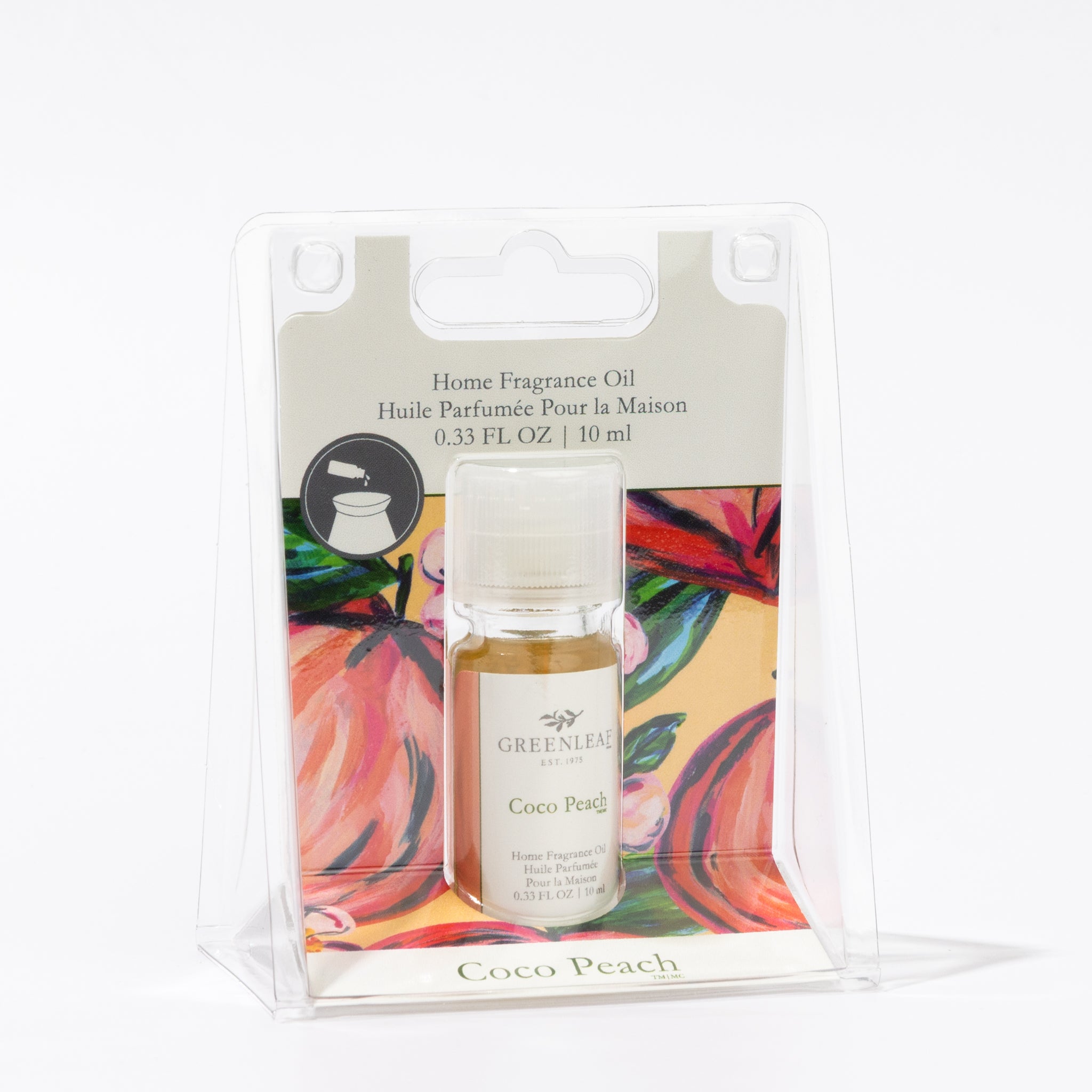 A small bottle of Greenleaf Gifts’ Coco Peach Home Fragrance Oil is shown in clear packaging with a peach-themed background, displaying product details on the front and offering a vibrant flameless fragrance.