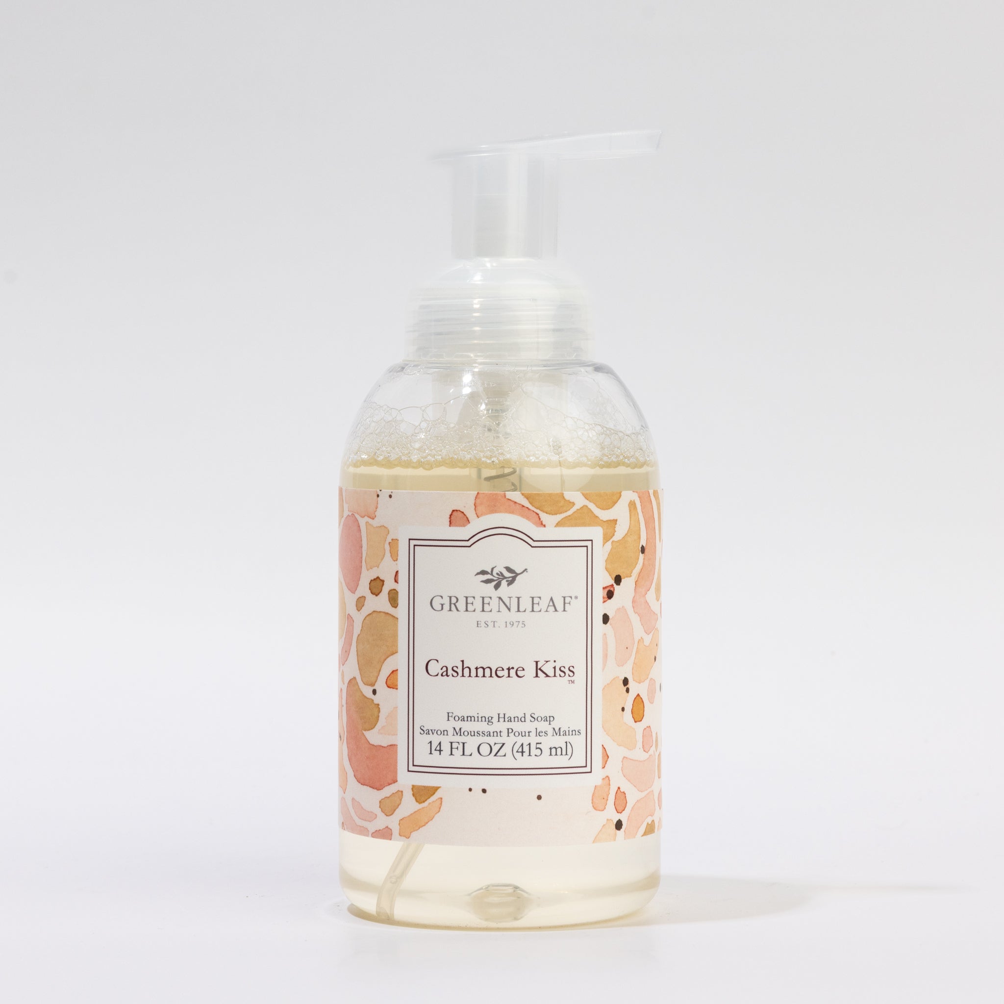 A 14 fl oz (415 ml) clear pump bottle of Greenleaf Gifts Cashmere Kiss Foaming Hand Soap with a pink and peach abstract label, displayed against a plain white background.