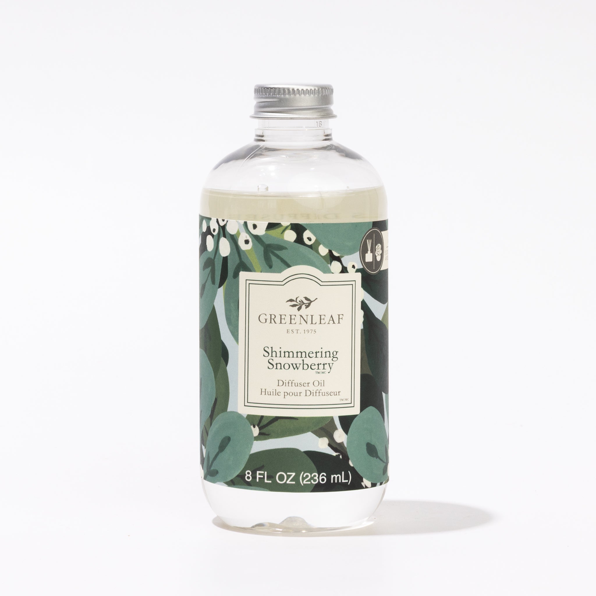 A clear 8 fl oz bottle of Greenleaf Gifts Shimmering Snowberry Diffuser Oil with a silver cap and a label with white berries and green leaves—ideal as a Flower Diffuser Refill.