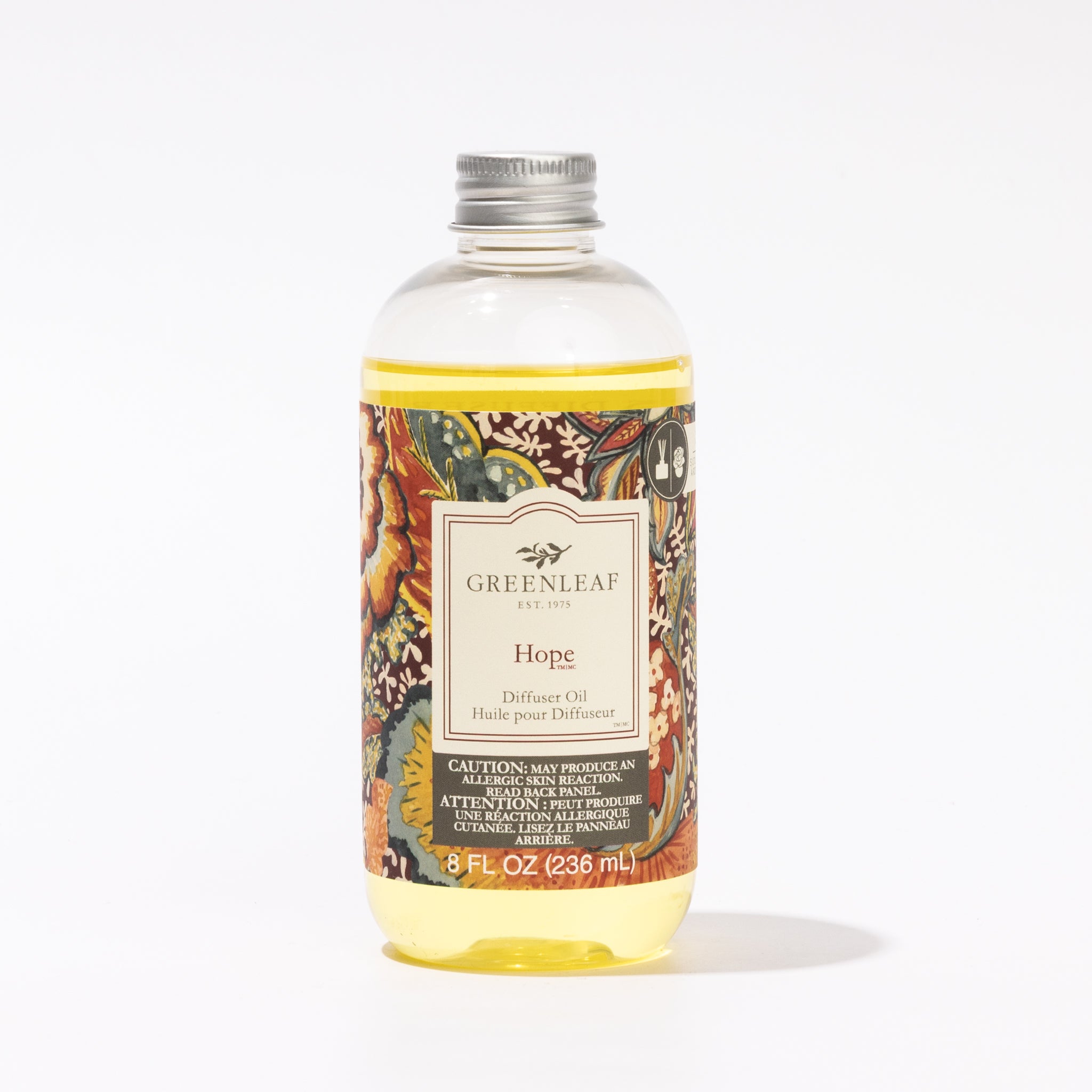 An 8 fl oz (236 ml) clear plastic bottle of Greenleaf Gifts Hope Diffuser Oil with a silver cap, yellow liquid, and a floral label—ideal as a home fragrance refill.