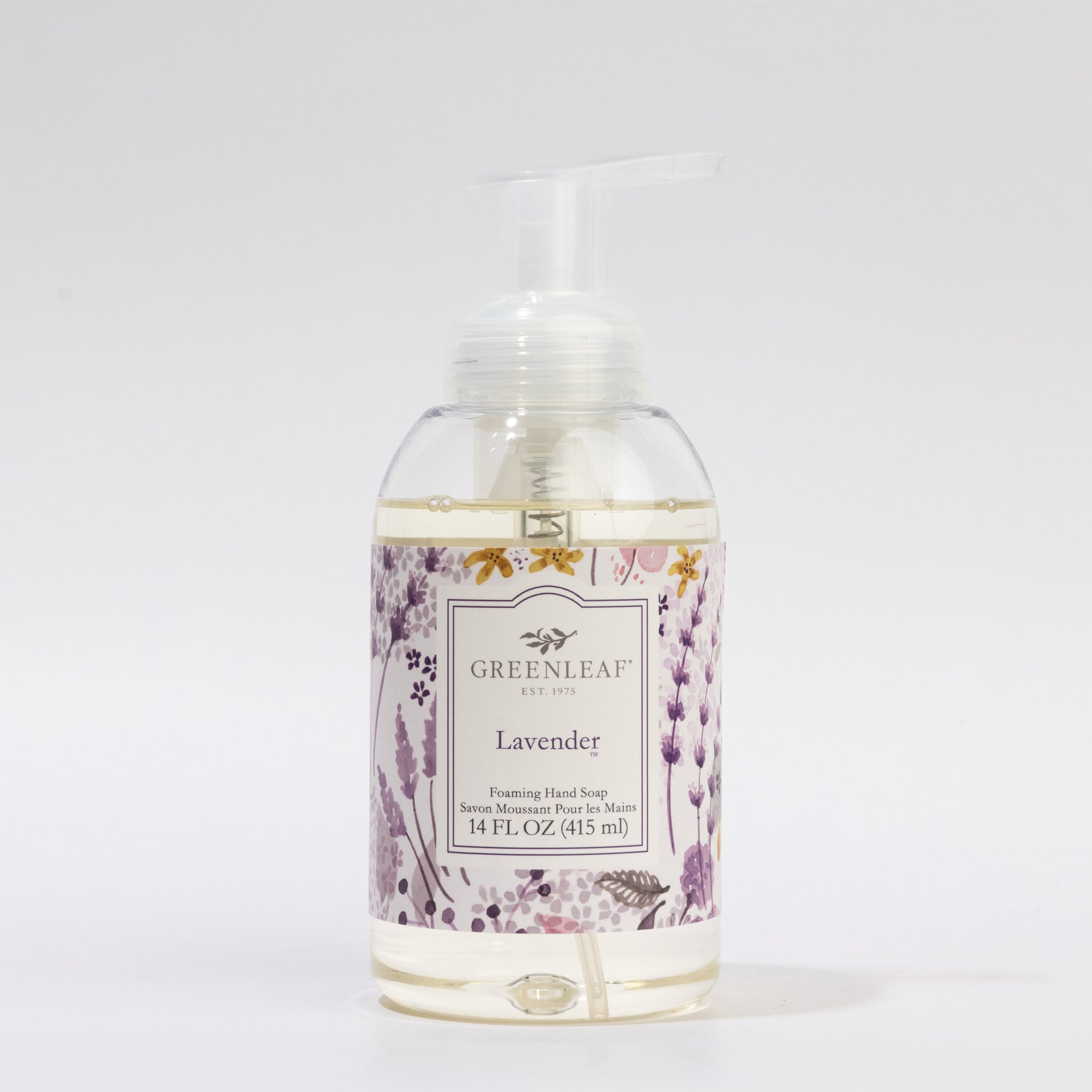 A clear 14 oz glass pump bottle of Greenleaf Gifts Lavender Foaming Hand Soap features a lavender floral label. Model GLG321514S, holds 415 ml, and is shown on a white background. See product specs for details.