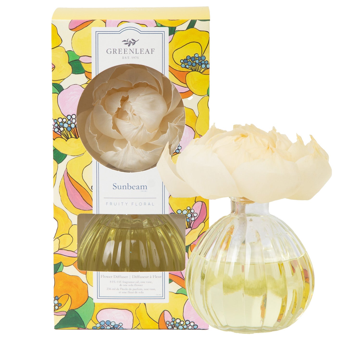 The Greenleaf Gifts Sunbeam Flower Diffuser features a round bottle with fragrance oil and cream sola paper petals, packaged in a floral-patterned box with yellow and pink flowers.